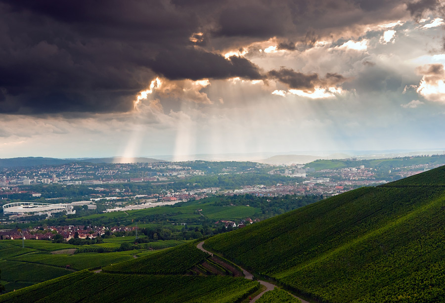 © Oleg Milyutin - Cloudy stormy sky with sun ray breaking through